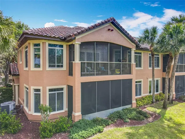 an aerial view of a residential houses with outdoor space