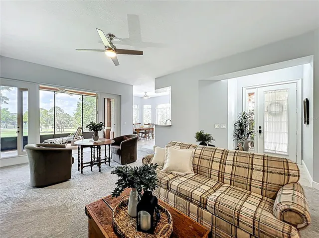 a kitchen with stainless steel appliances a refrigerator sink and cabinets