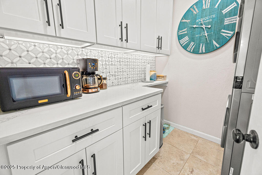 193 Barker Street Craig, CO 81625 - Photo 13 of 50 a kitchen with a sink and cabinets