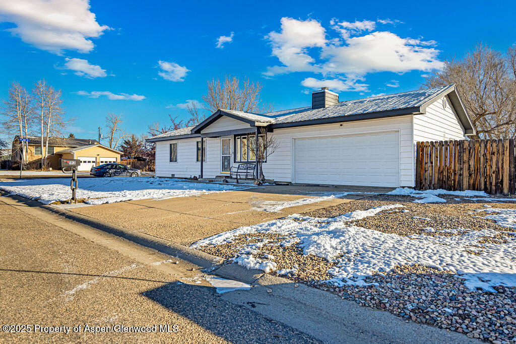 193 Barker Street Craig, CO 81625 - Photo 2 of 50 a front view of a house with a yard