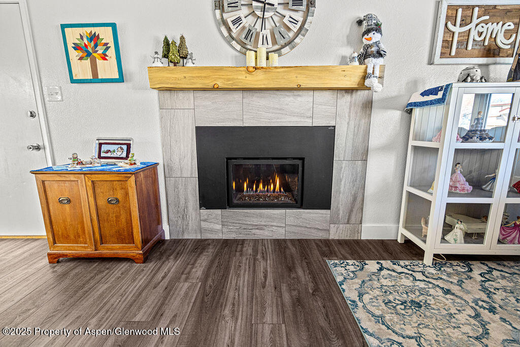 193 Barker Street Craig, CO 81625 - Photo 8 of 50 a living room with furniture and a fireplace
