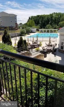 a view of a lake from a balcony