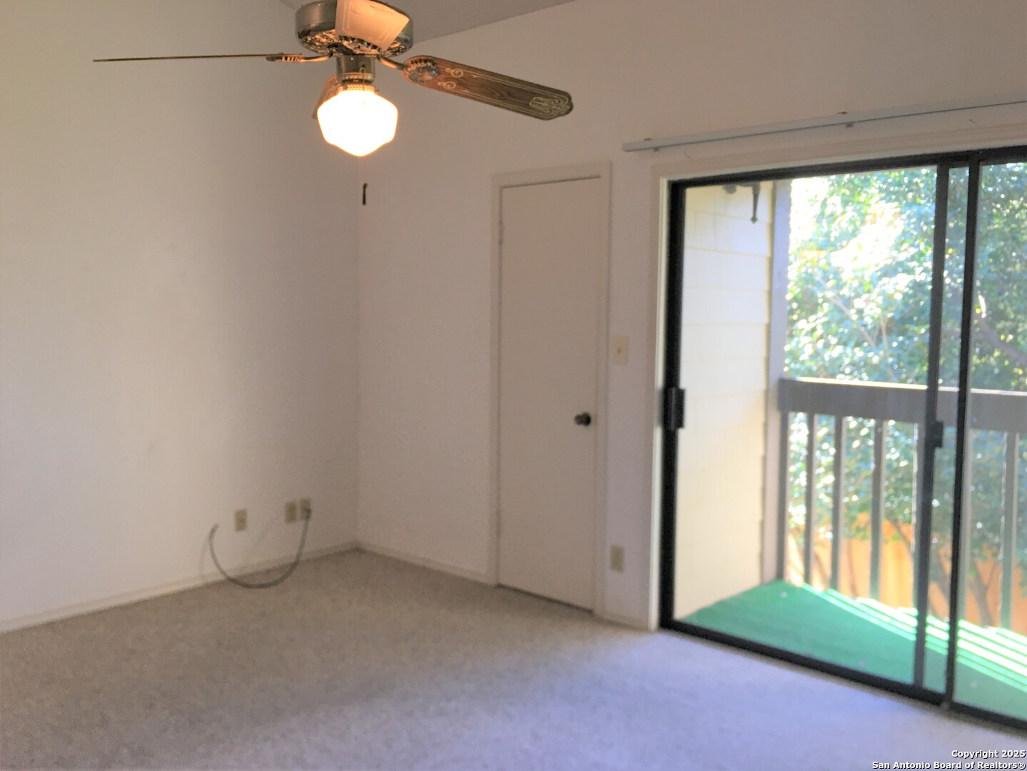 11815 Vance Jackson Road, Unit 1804 San Antonio, TX 78230 - Photo 7 of 10 a view of empty room with floor to ceiling window