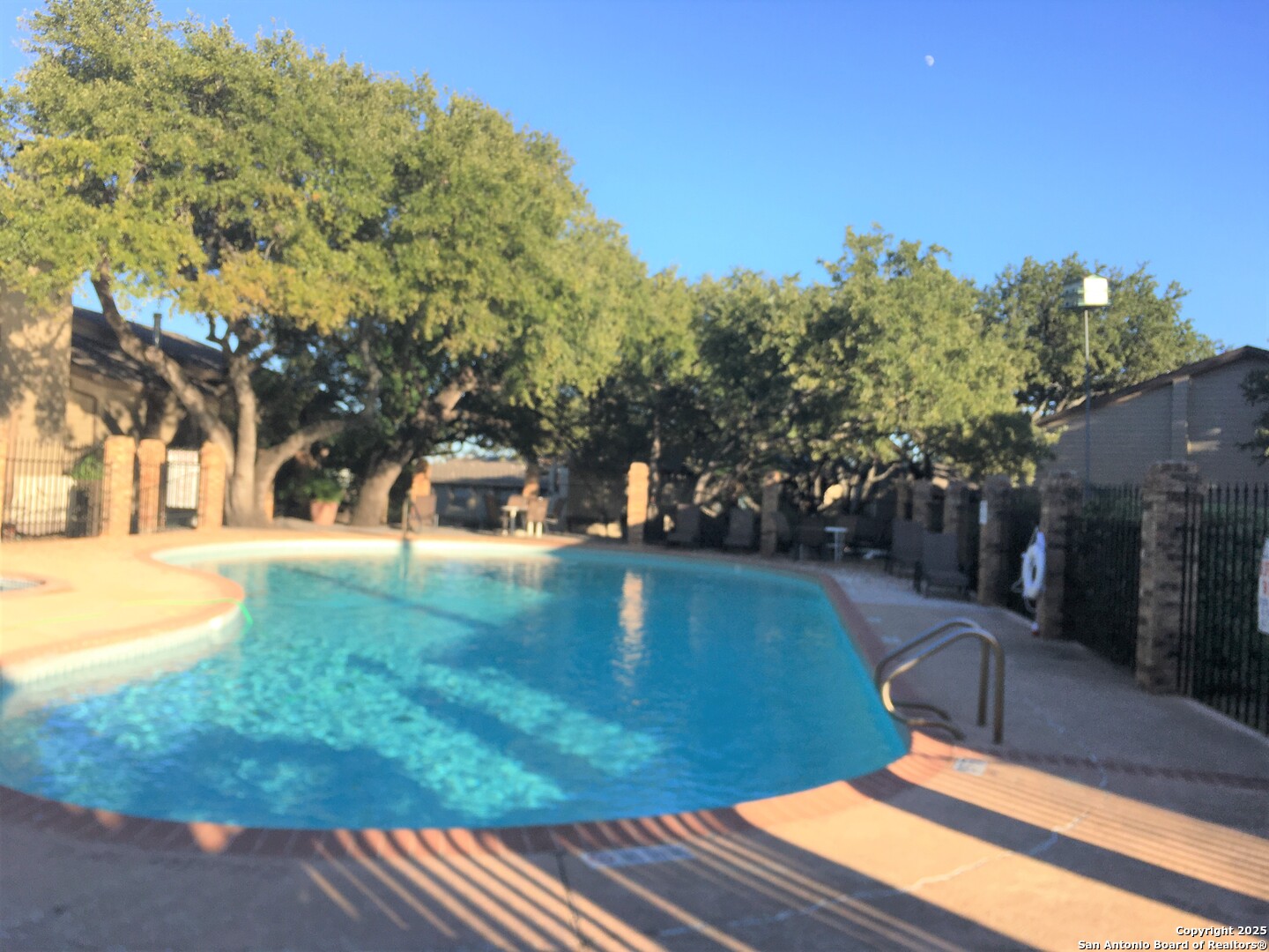 11815 Vance Jackson Road, Unit 1804 San Antonio, TX 78230 - Photo 10 of 10 a view of a yard with a house