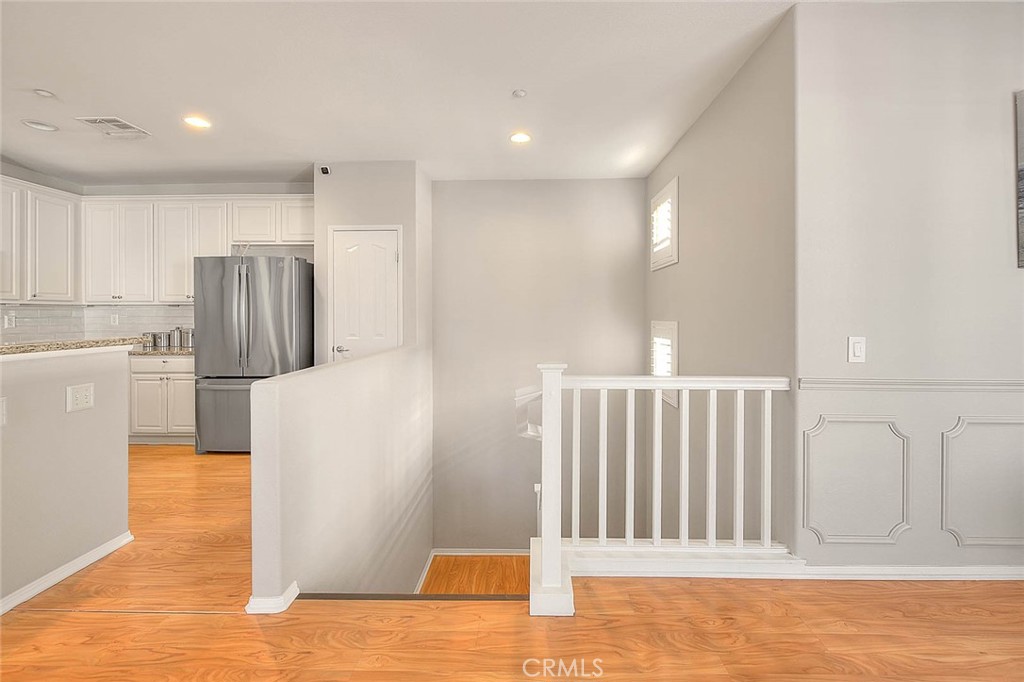 11450 Church Street, Unit 63 Rancho Cucamonga, CA 91730 - Photo 11 of 52 a view of kitchen with furniture and refrigerator