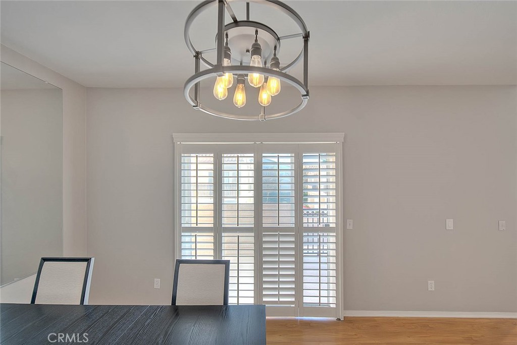 11450 Church Street, Unit 63 Rancho Cucamonga, CA 91730 - Photo 13 of 52 a view of wooden floor and windows in a room