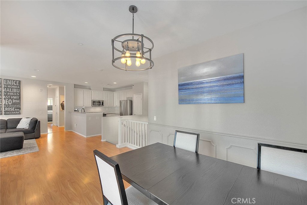 11450 Church Street, Unit 63 Rancho Cucamonga, CA 91730 - Photo 16 of 52 a view of a dining room with furniture