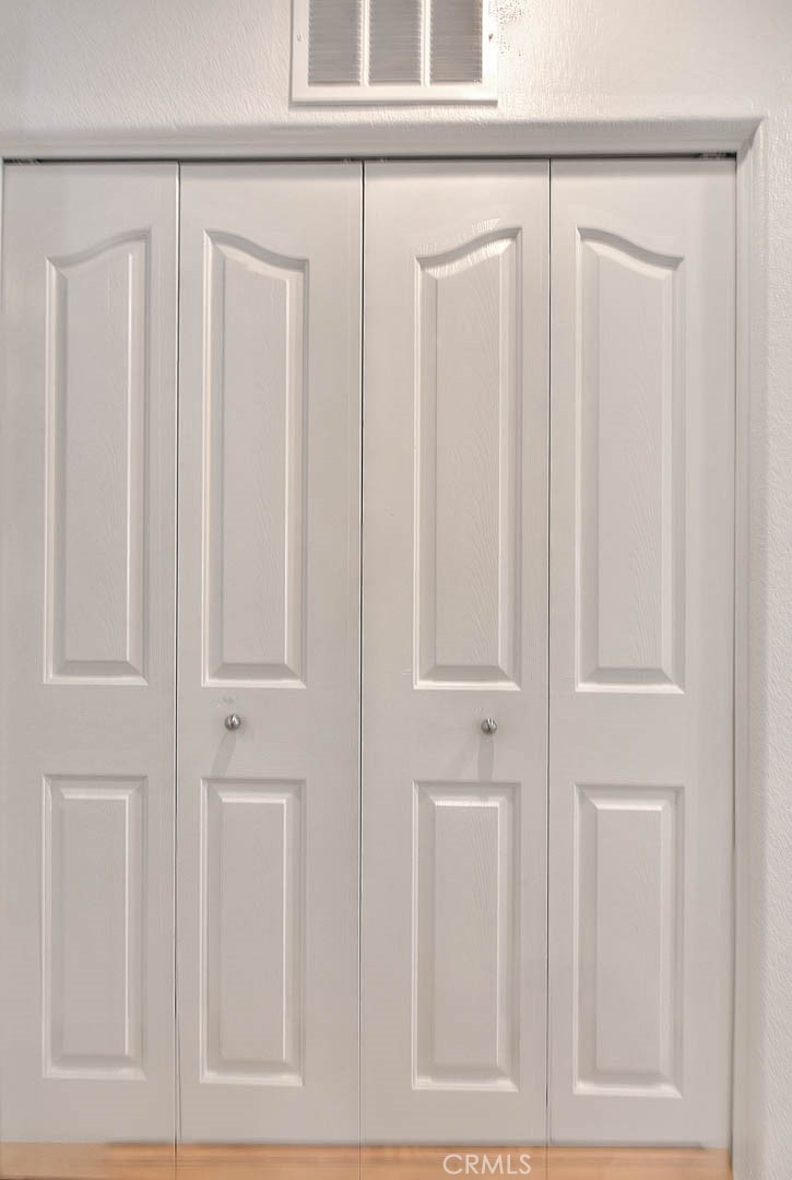 11450 Church Street, Unit 63 Rancho Cucamonga, CA 91730 - Photo 31 of 52 a view of a wooden door