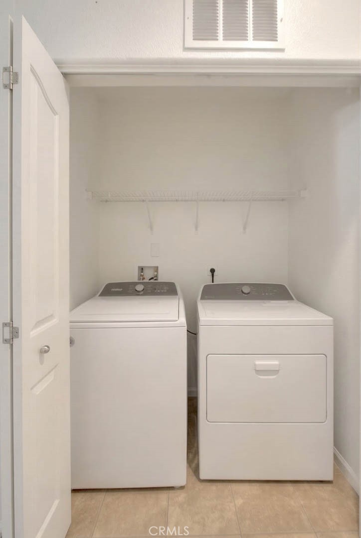 11450 Church Street, Unit 63 Rancho Cucamonga, CA 91730 - Photo 32 of 52 a utility room with dryer and washer