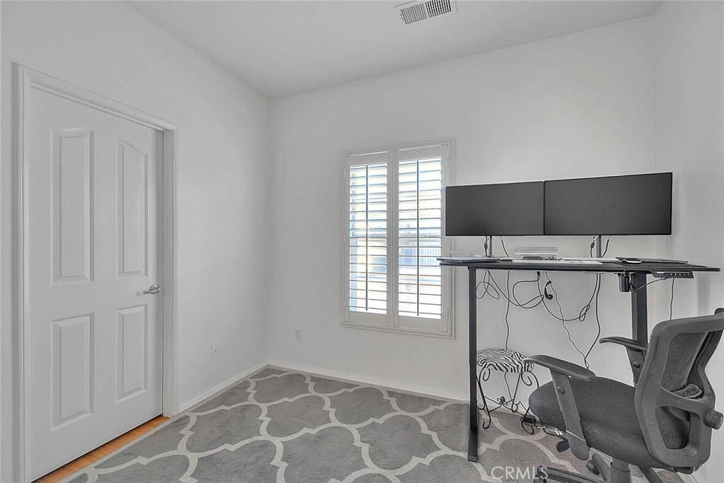 11450 Church Street, Unit 63 Rancho Cucamonga, CA 91730 - Photo 33 of 52 a view of a livingroom with furniture and windows
