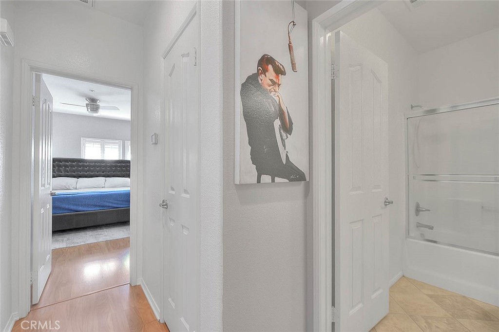 11450 Church Street, Unit 63 Rancho Cucamonga, CA 91730 - Photo 35 of 52 a bathroom with a tub and a shower