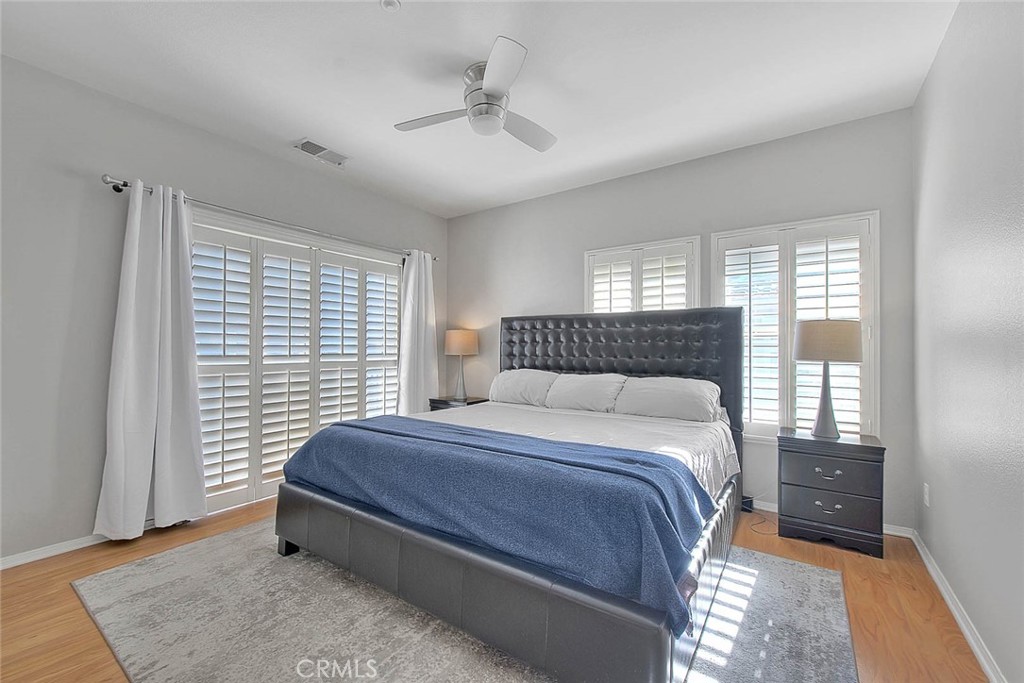 11450 Church Street, Unit 63 Rancho Cucamonga, CA 91730 - Photo 36 of 52 a bedroom with a bed and a window