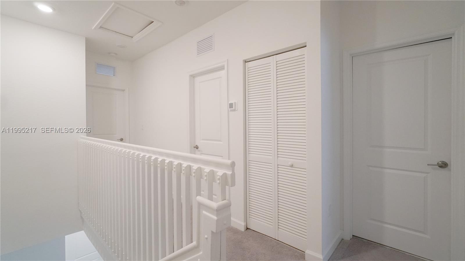 11870 Southwest 246th Street Homestead, FL 33032 - Photo 26 of 31 a view of a hallway