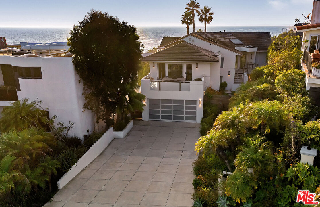 31558 Victoria Point Road Malibu, CA 90265 - Photo 1 of 55 a front view of a house