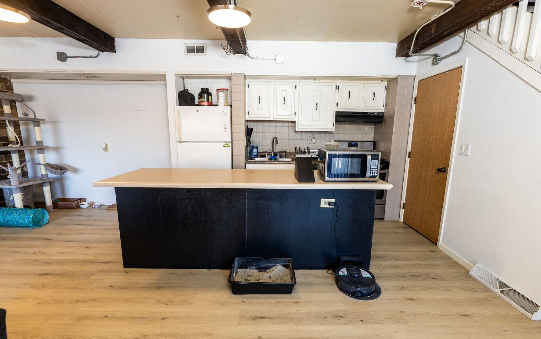 902 Kenneth Circle, Unit 6 Elgin, IL 60120 - Photo 5 of 24 a kitchen with stainless steel appliances kitchen island granite countertop a refrigerator and a stove top oven