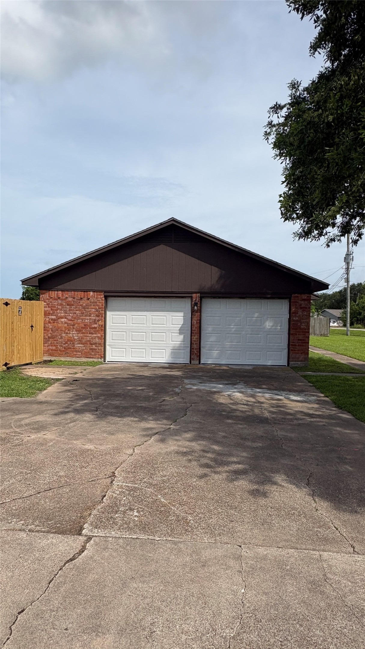 2006 Jones Road Freeport, TX 77541 - Photo 9 of 9 Left side of home with 2 car garage.