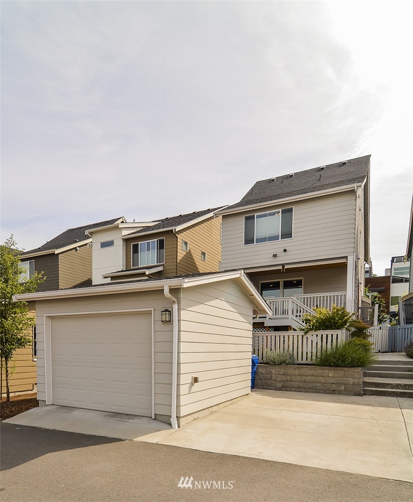 4417 Renton Avenue South Seattle, WA 98108 - Photo 11 of 21 a front view of a house with a garage
