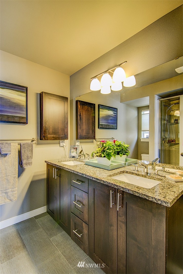 4417 Renton Avenue South Seattle, WA 98108 - Photo 14 of 21 a bathroom with a sink and a mirror