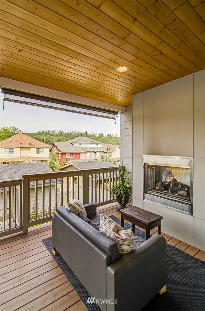 4417 Renton Avenue South Seattle, WA 98108 - Photo 8 of 21 a balcony with furniture and wooden floor