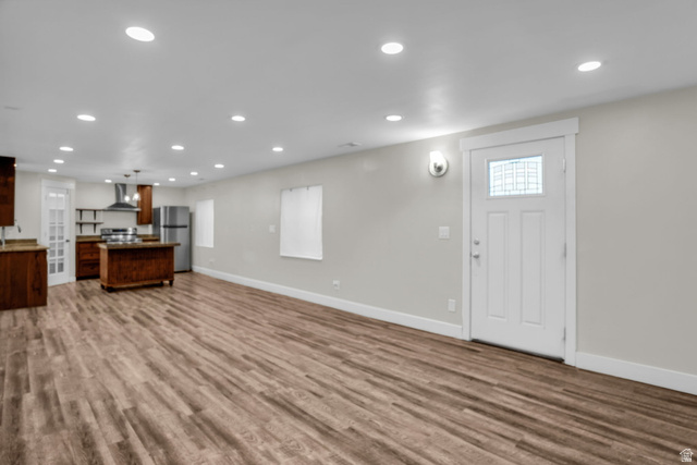 1836 West 800 North Mapleton, UT 84663 - Photo 21 of 38 Unfurnished living room with recessed lighting and light wood-style floors