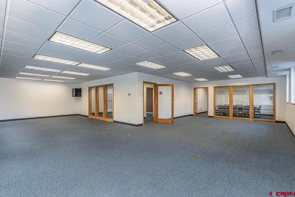 a view of empty room with windows