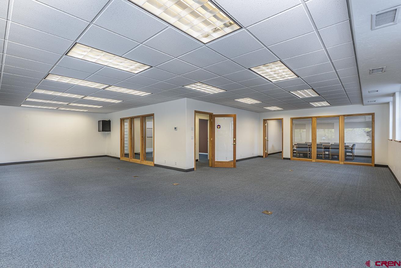 1211 Main Avenue Durango, CO 81301 - Photo 3 of 12 a view of empty room with windows