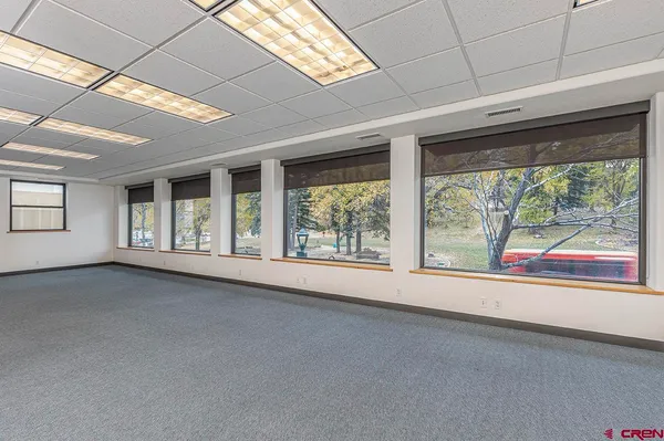 an empty room with windows
