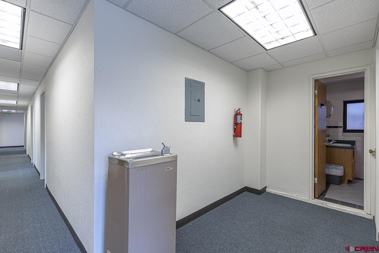 1211 Main Avenue Durango, CO 81301 - Photo 9 of 12 a view of a hallway with workspace