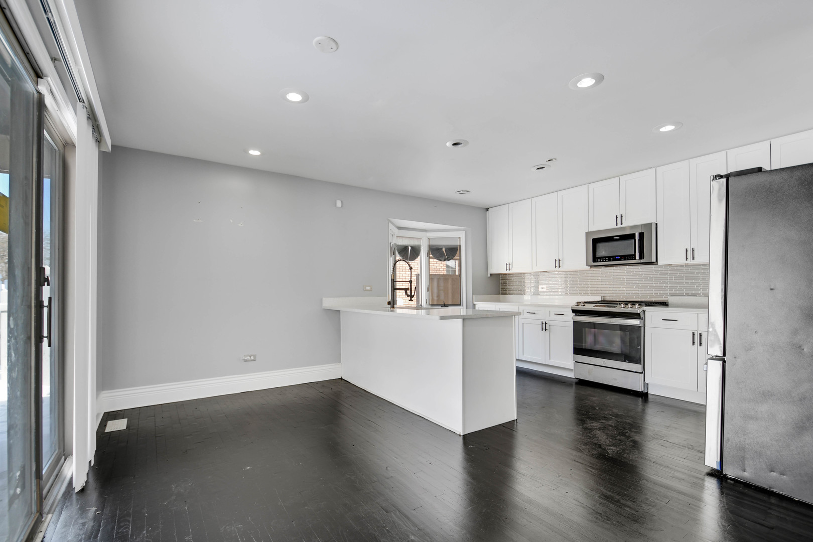 249 Milburn Avenue Crete, IL 60417 - Photo 12 of 46 a view of kitchen with wooden floor and electronic appliances