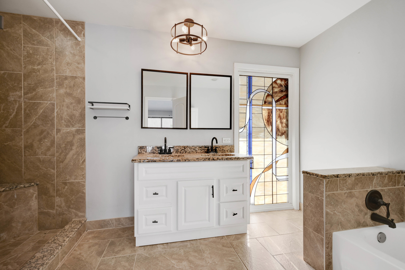 249 Milburn Avenue Crete, IL 60417 - Photo 30 of 46 a bathroom with a granite countertop sink a mirror and a bathtub