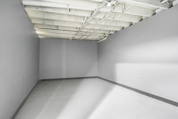 a view of a room with racks on the wall
