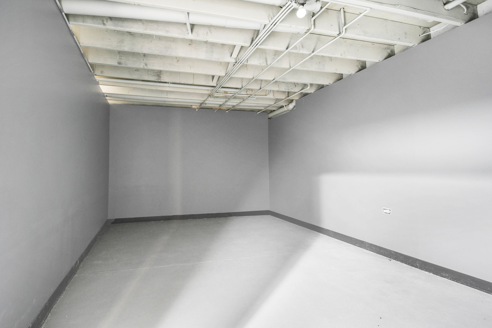 249 Milburn Avenue Crete, IL 60417 - Photo 39 of 46 a view of a room with racks on the wall