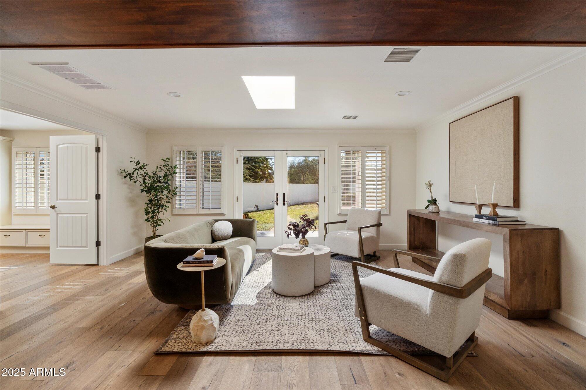 6533 East Maverick Road Paradise Valley, AZ 85253 - Photo 11 of 20 a living room with furniture and wooden floor