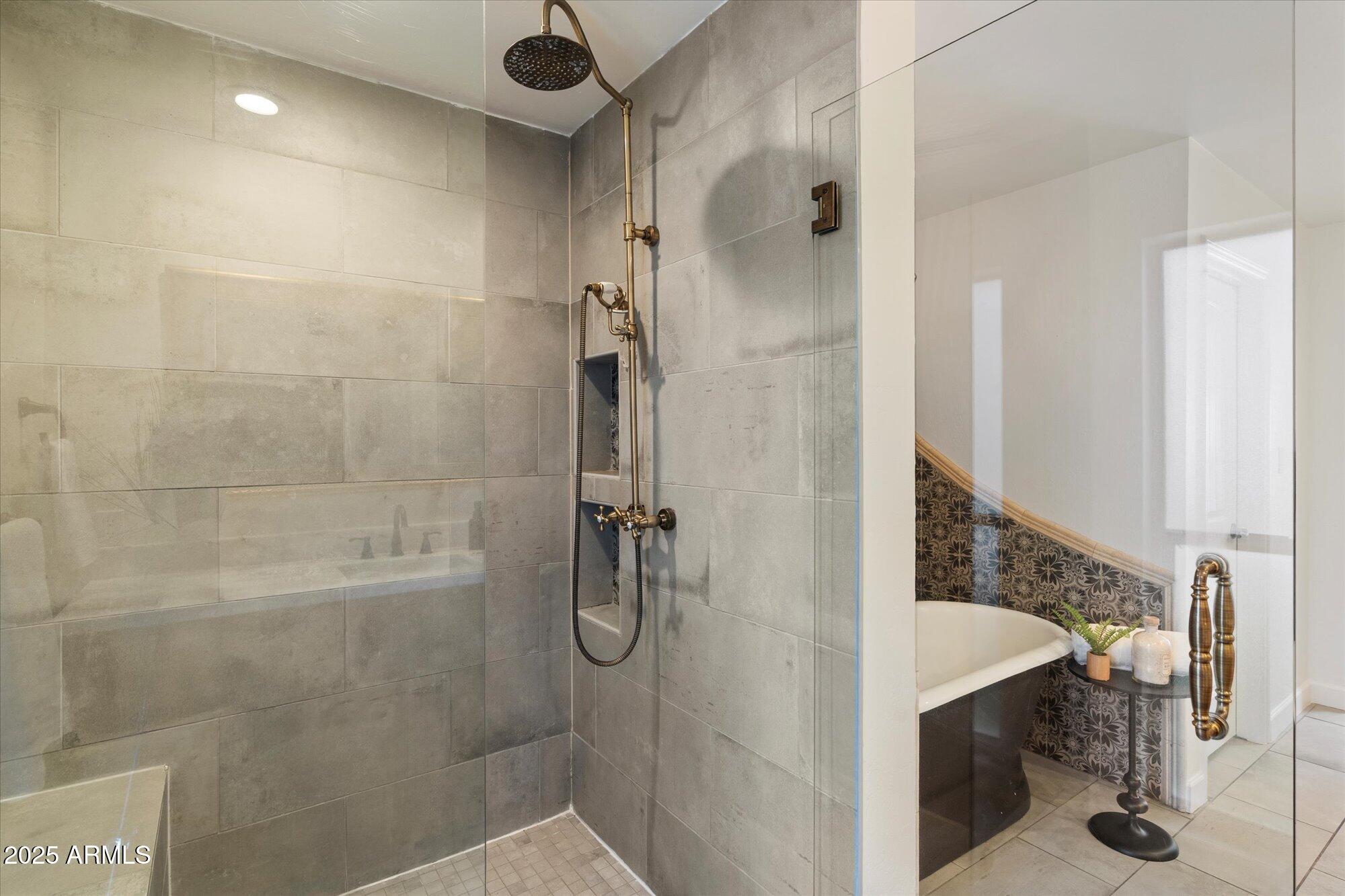 6533 East Maverick Road Paradise Valley, AZ 85253 - Photo 15 of 20 a bathroom with a shower and a sink
