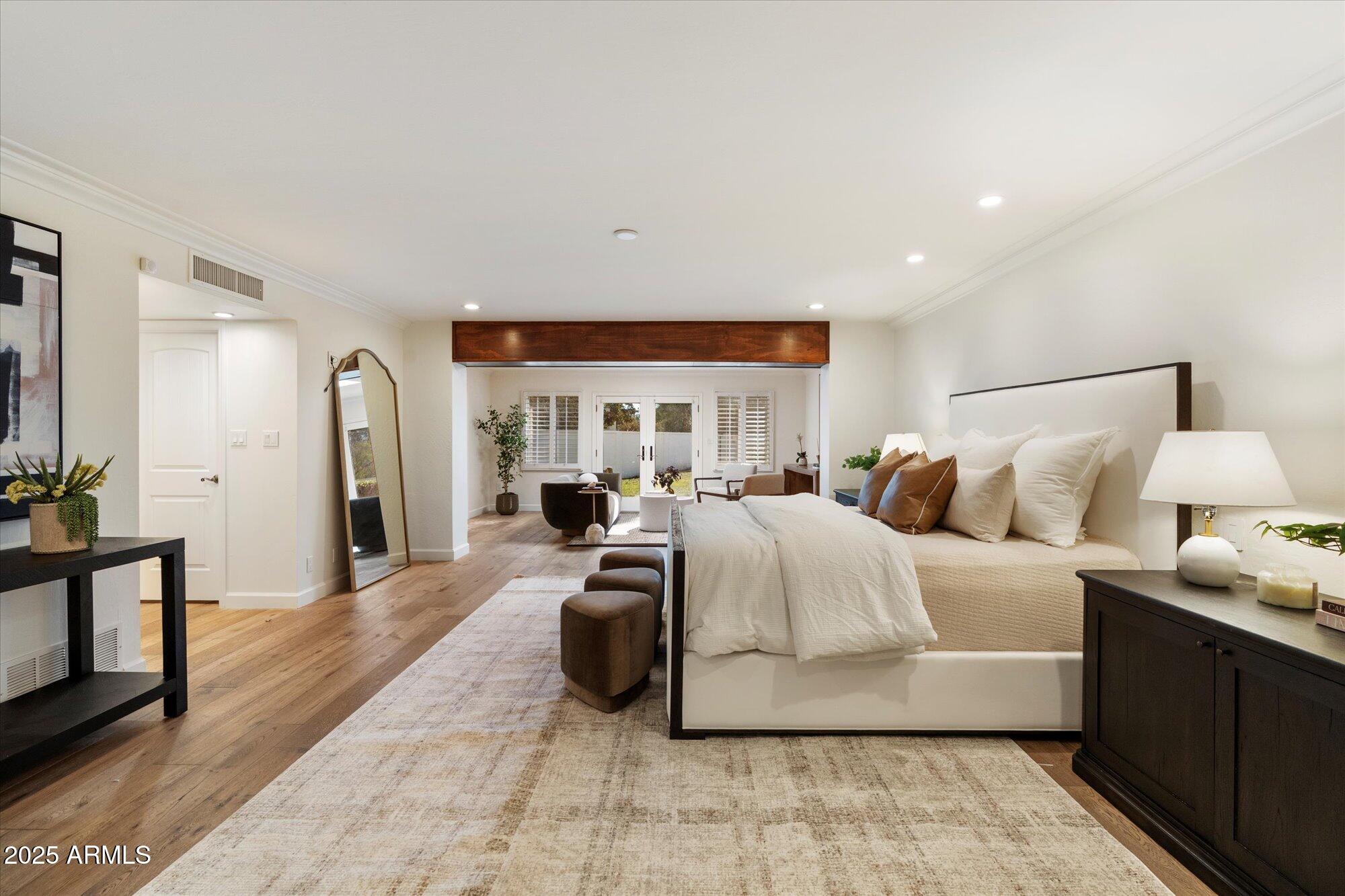 6533 East Maverick Road Paradise Valley, AZ 85253 - Photo 10 of 20 a living room with a balcony furniture and a flat screen tv