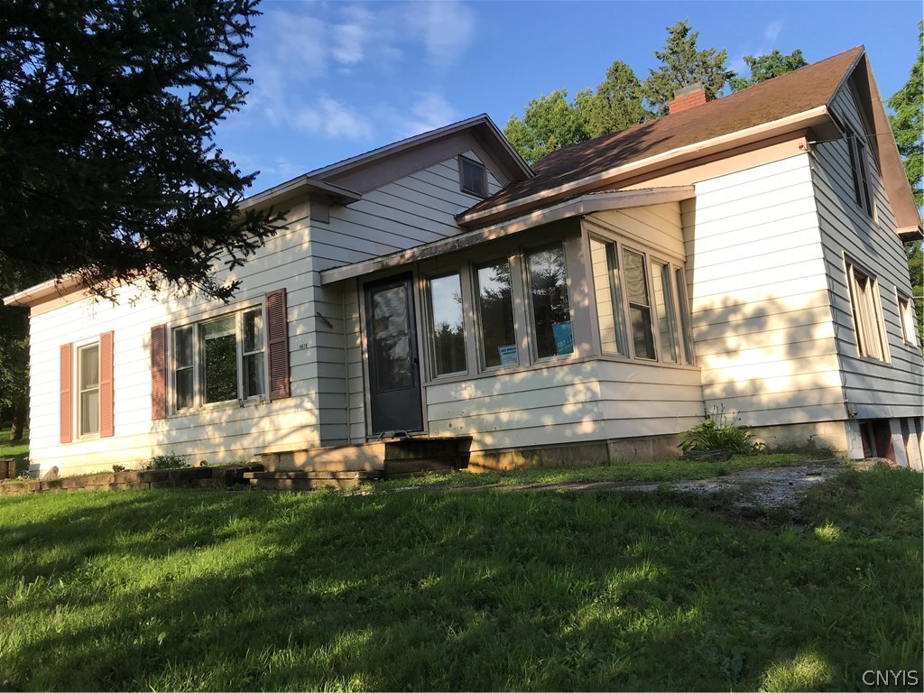Front of house, three season porch