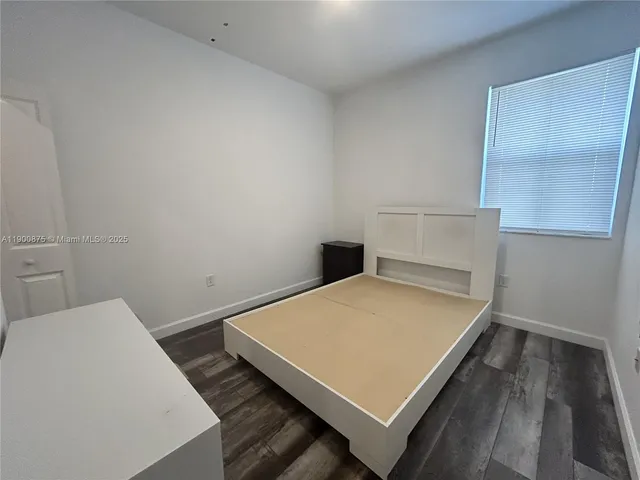 a view of a backyard with garden