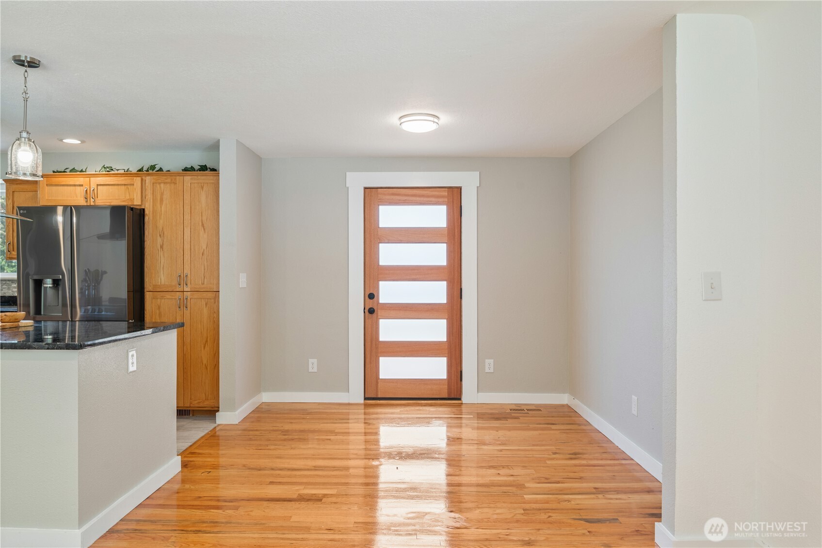 2903 Huntington Place Longview, WA 98632 - Photo 11 of 40 a view of empty room with wooden floor and fan