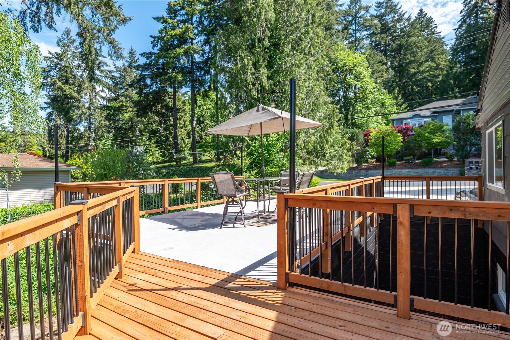 2903 Huntington Place Longview, WA 98632 - Photo 26 of 40 a view of a roof deck with wooden floor and fence