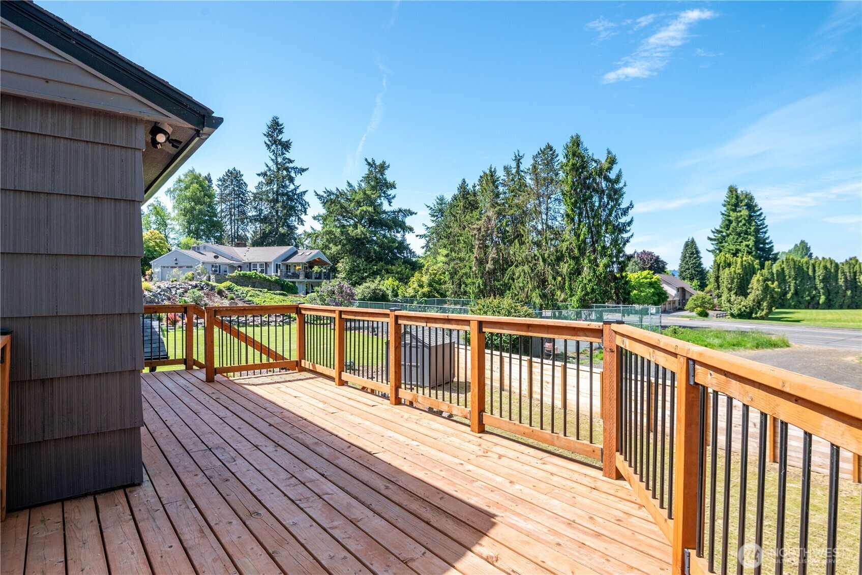 2903 Huntington Place Longview, WA 98632 - Photo 27 of 40 a view of balcony with wooden floor and fence