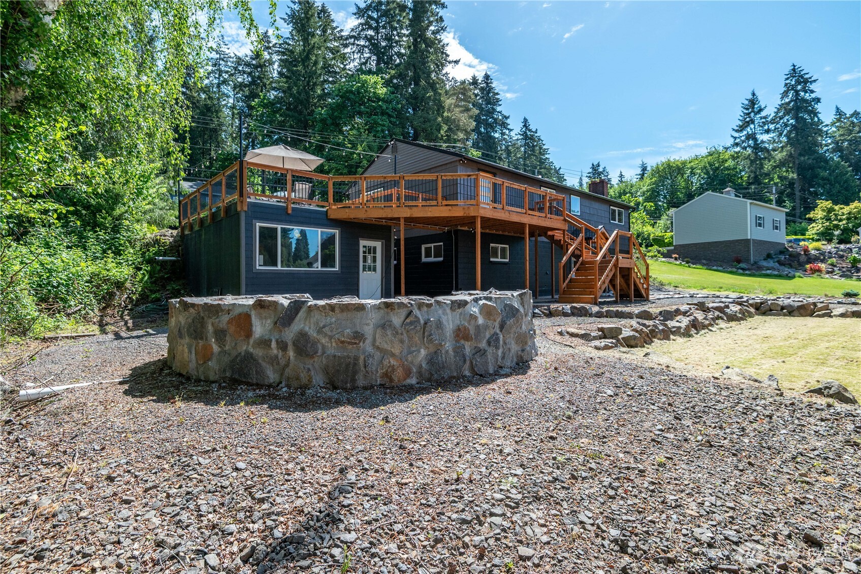 2903 Huntington Place Longview, WA 98632 - Photo 30 of 40 a view of a house with a yard and sitting area