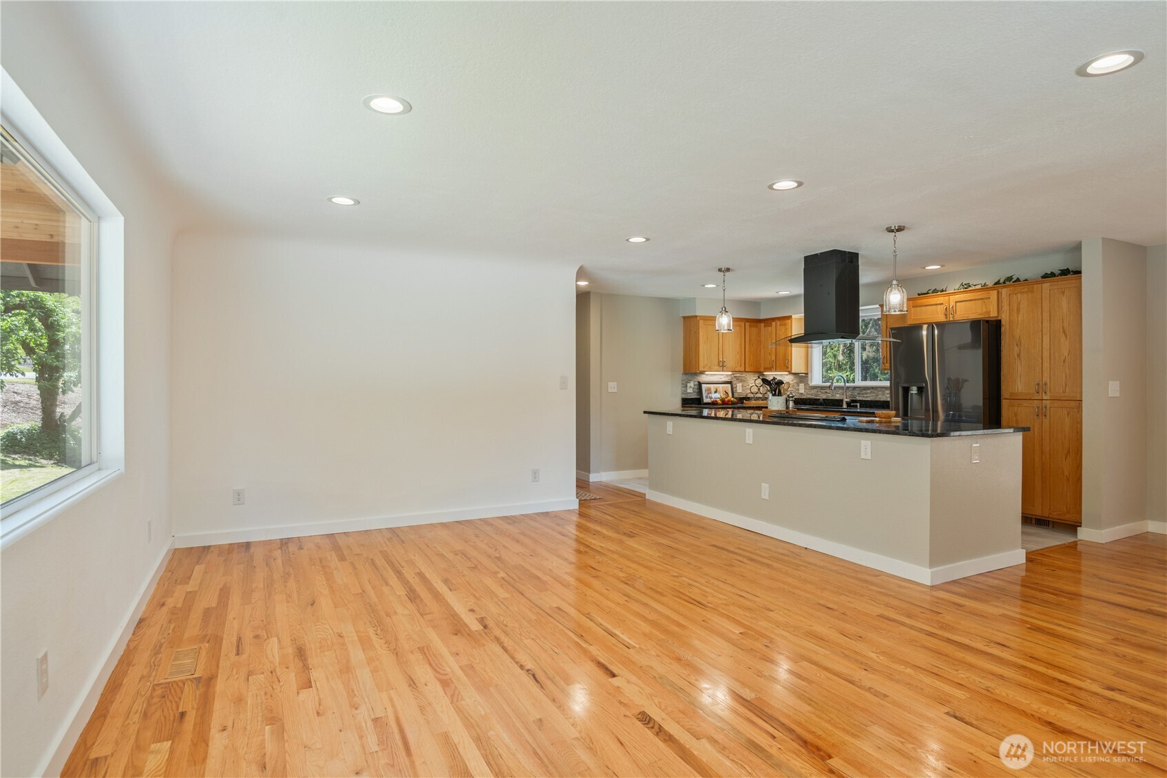 2903 Huntington Place Longview, WA 98632 - Photo 10 of 40 a view of a kitchen with a sink and a refrigerator