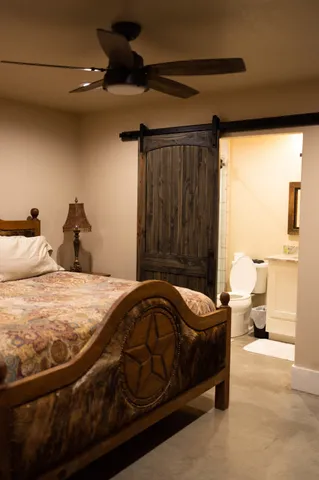 a bathroom with a shower and a mirror