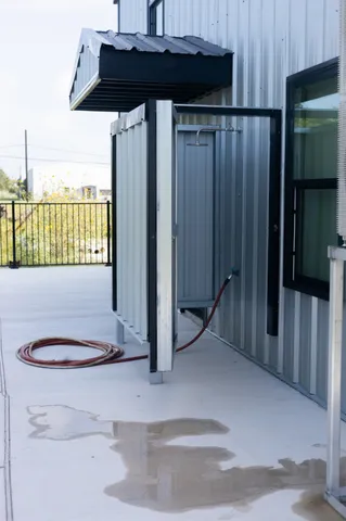 a view of a balcony with a pot