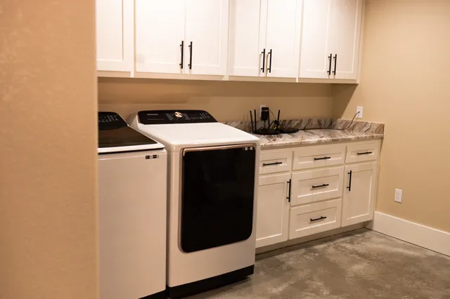 a kitchen with a stove and a microwave