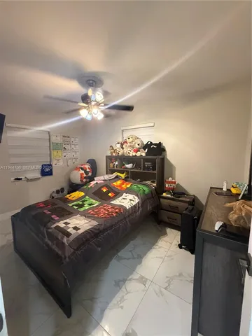 a bed sitting in a room