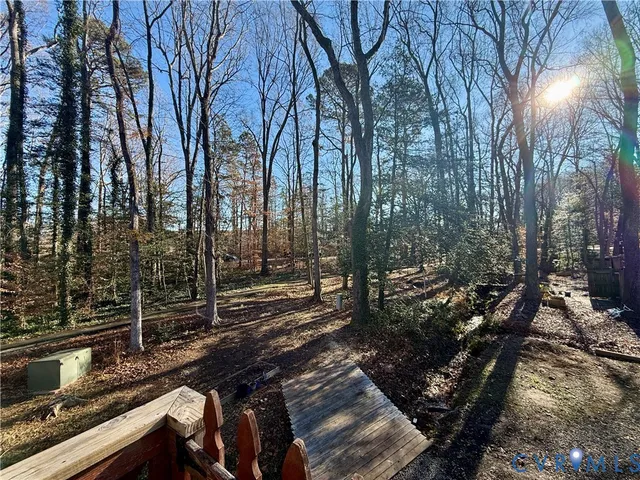 a view of a backyard of the house