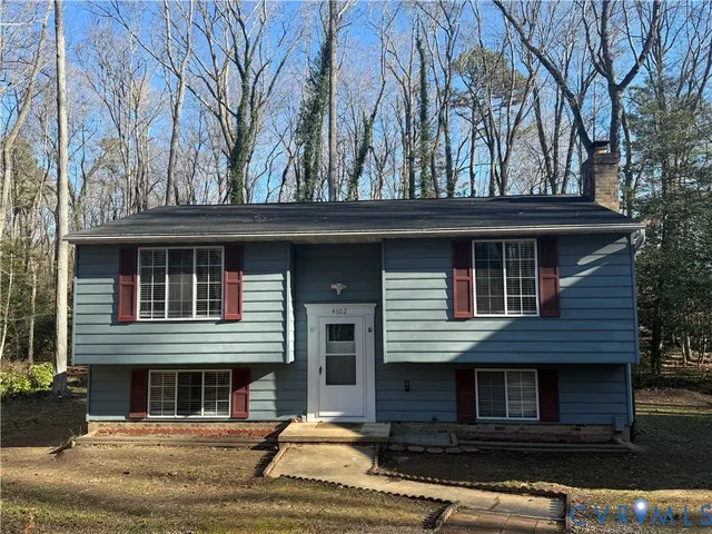 front view of a house with a small yard