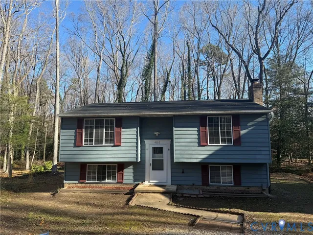 front view of a house with a trees