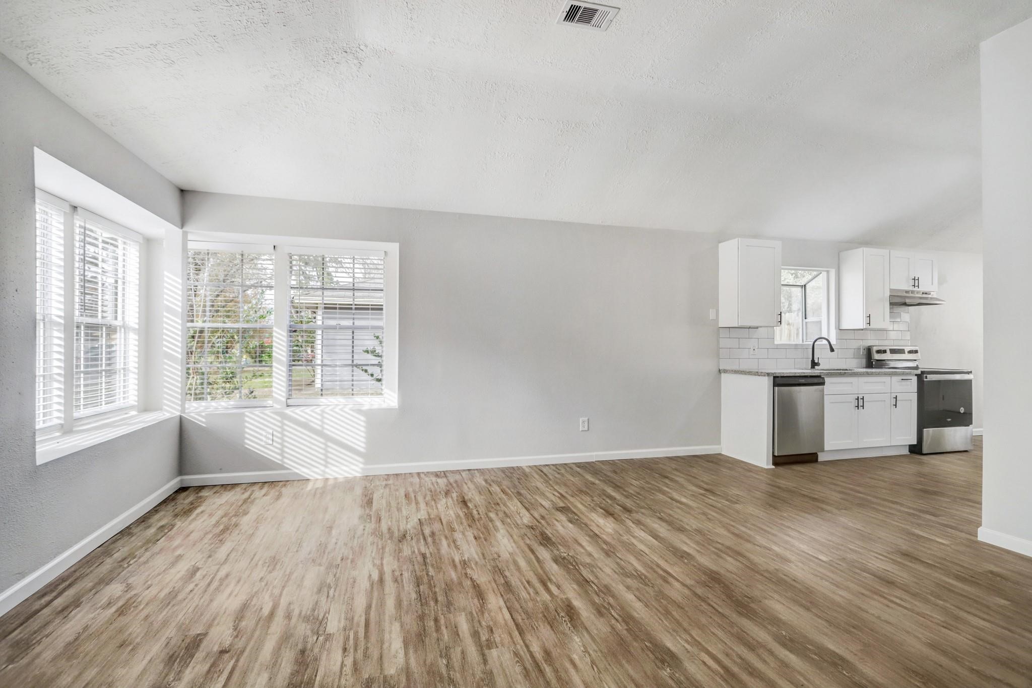 15910 Plover Court Humble, TX 77396 - Photo 3 of 10 a view of kitchen and wooden floor